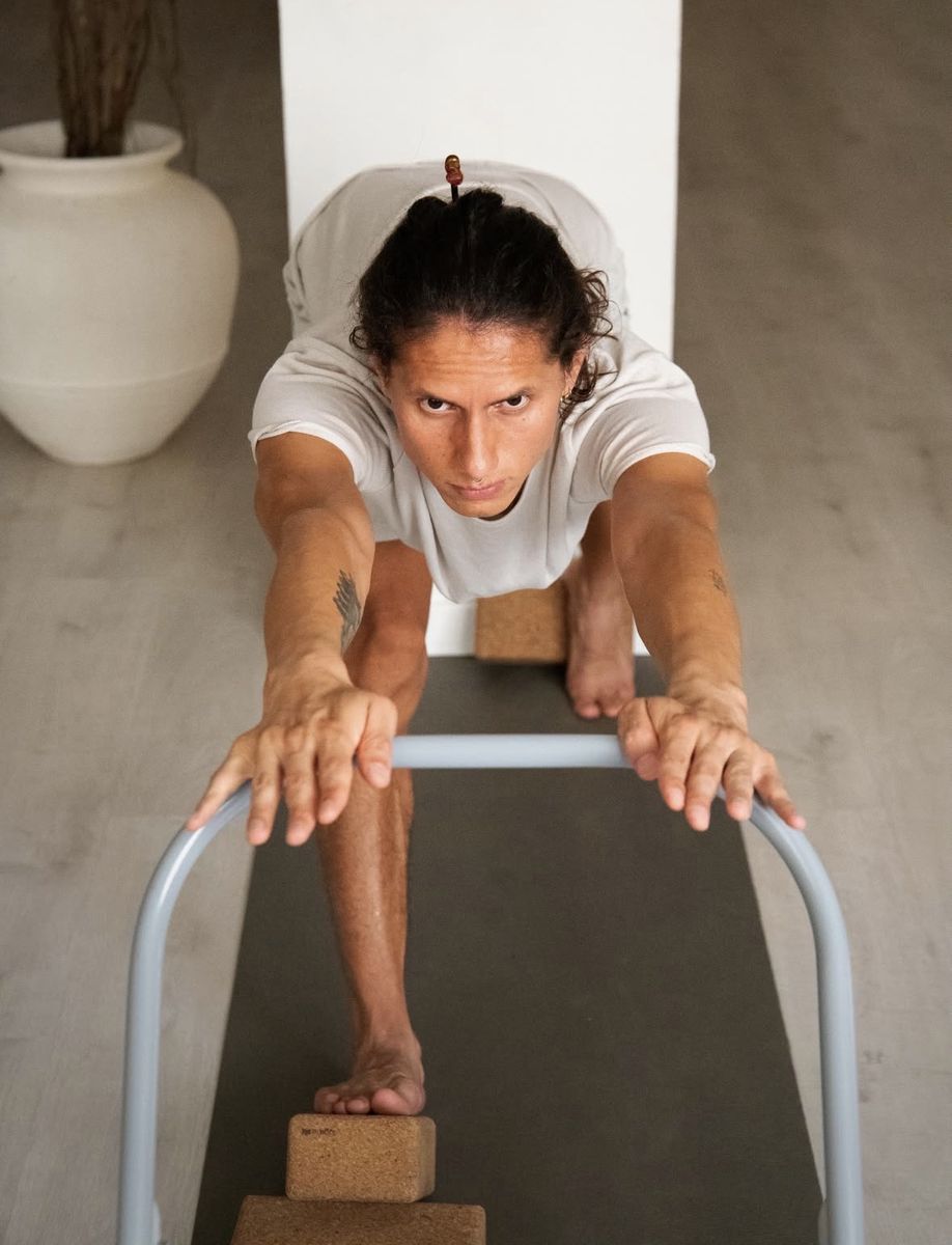 Chakra in an Iyengar pose with a chair and blocks