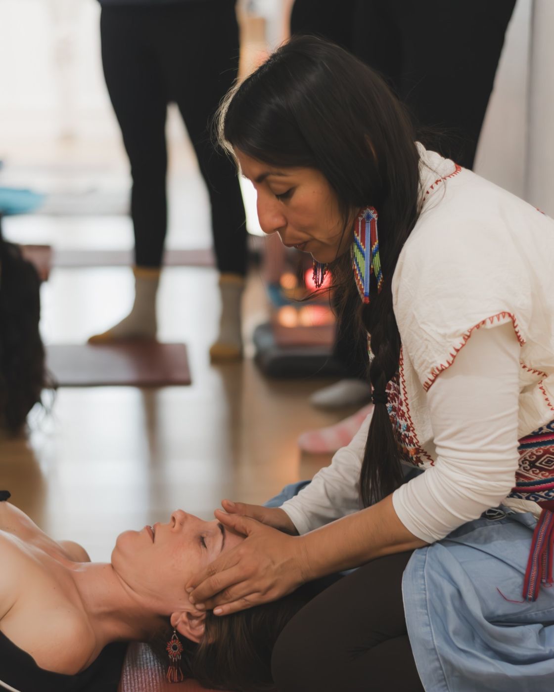 Therapist guiding a relaxation in the studio